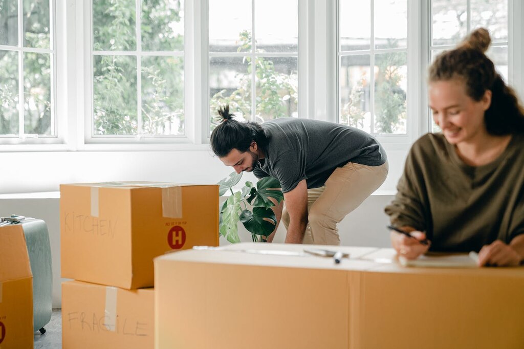 People packing for their rental home